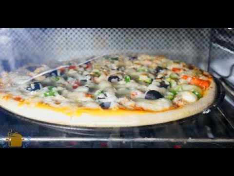 preparing Pizza at home in 5 minute | Pizza Recipe Pakistani ( in urdu ) preparing Pizza at home in 5 minute | Pizza Recipe Pakistani ( in urdu )