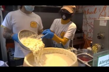 ITALIAN PASTA IN A CHEESE WHEEL, FRESH HANDMADE ITALIAN PASTA ROLLED IN PARMESAN CHEESE WHEEL