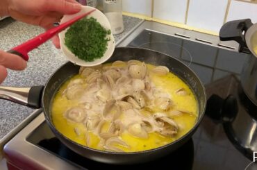Clams and Prawns with garlic, wine and pasta