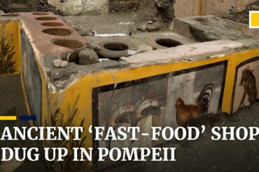 Ancient Roman ‘fast-food’ counter found in ruins of Pompeii is unveiled by Italian archaeologists