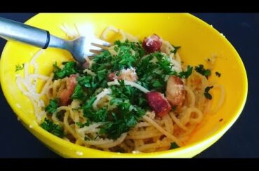 Carbonara, an Italian Pasta with Smoked Bacon cubes (Pork) & Parmazon Cheese & Eggs.