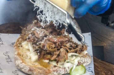 Italian Pulled Pork Big Sandwich Covered in Cheese. London Street Food