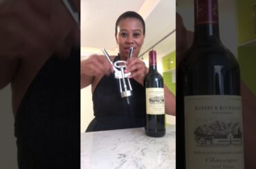 How to open a bottle of wine using a winged corkscrew.
