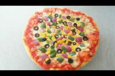 Home made pizza vegetable by cooking with parveen