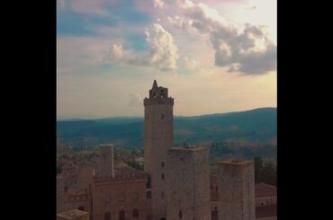 flight over a mediaeval town of fine towers san gimignano tuscany italy