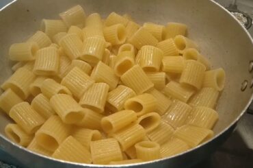 Italian Pasta alla GRICCIA. Mezze Maniche  Rigate pasta with pig cheek (guanciale)
