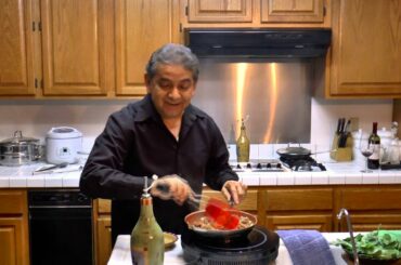 Cooking Penne Rigate and Hot Italian Sausage