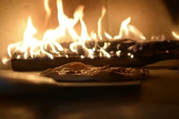 original Italian thin-crust pizza from Ajindai Floating Cafe