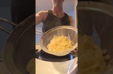 Italian pasta with homemade red wine meat sauce and freshly shredded parmesan oregano cheese.