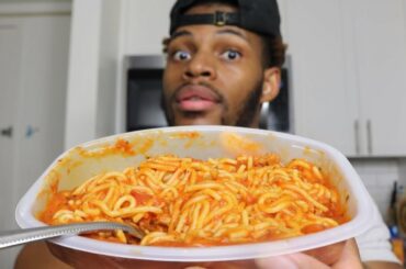 Eating lean cuisine spaghetti
