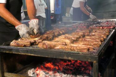 Italian Ribs Festival. MAXI Grill of Ribs, Sausages and Skewers. Italy Street Food