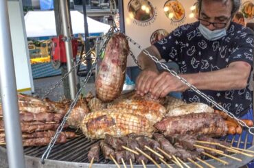 Greek Style Grill of Meats, Gyros, Pita Bread. Street Food at Italy Food Fair