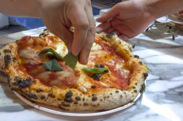 Italian Pizza Baked in a Wood Fired Oven on a Tricycle. Street Food of London