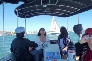 Heat wave Cooling off Duffy boat cruise at the Grand Canal in Balboa Island Newport Beach California