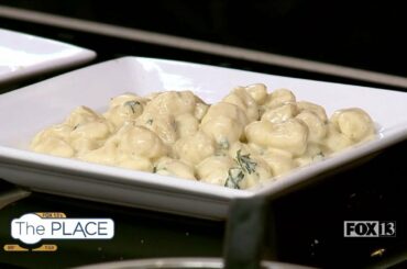 Finishing touches on gnocchi gorgonzola recipe