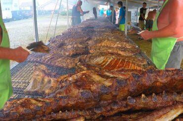 Extreme Grill of Pork Ribs on the Road. Italian Countryside Street Food Festival