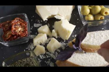 video of traditional italian food parmesan cheese  R2V74UY