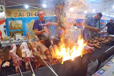 Italian Masters Roasts Huge Grills of Pork Meat. Italy Street Food from Sardinia