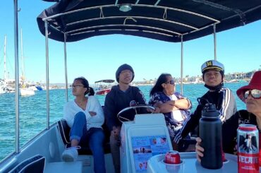 Heat wave Cooling off Duffy boat cruise at the Grand Canal in Balboa Island Newport Beach California