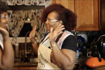 Mom and Daughter Making Spaghetti