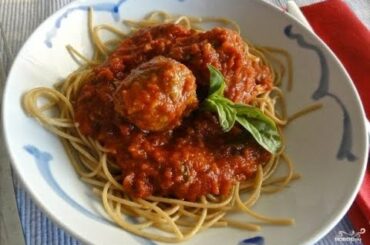 Pasta with meatballs in tomato sauce. Holiday recipes