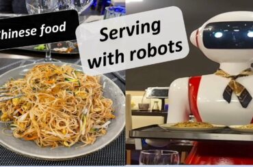 Serving food with robots - Chinese Restaurant in Italy ( Rome)