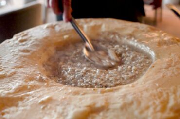 Amazing Italian Cuisine | Risotto is cooked on flaming Parmigiano Reggiano Cheese