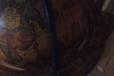 Italian Globe that opens to put wine or liquor bottles in 20211219 231544