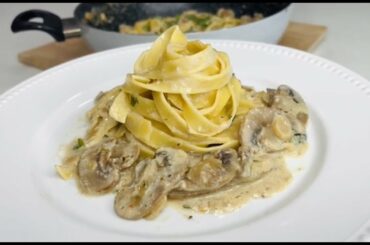 Italian Tagliatelle Pasta with creamy mushroom white sauce and sausage. #pastarecipe #mushroompasta