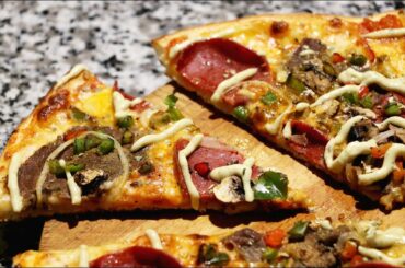 Italian pizza: steak, chicken,  pepperoni  and vegetable