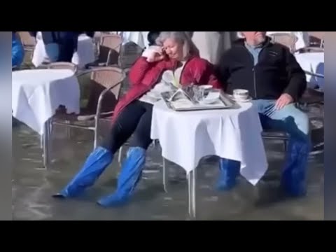 Severe flooding doesn’t stop tourists from dining in the city of Venice, Italy Severe flooding doesn’t stop tourists from dining in the city of Venice, Italy