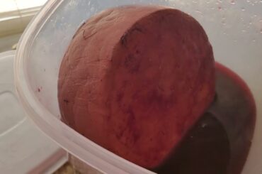 Cheese soaking in Italian sweet red wine day 5