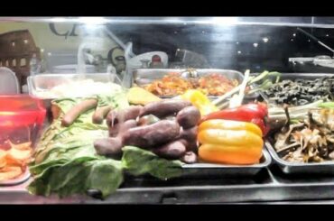 Italian Street Food Fair in Olbia, Sardinia. Huge Skewers, Roasts, Sweets