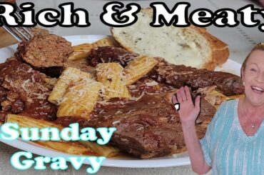 Italian Sunday Gravy Recipe - Hearty Sunday Sauce with Pork, Italian Sausage and Homemade Meatballs