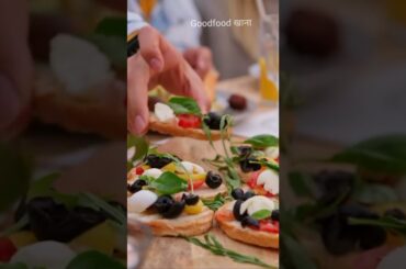 Person Picking up Food Starter from a Dining Table #streetfood #shorts