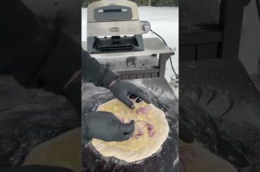 Red wine pizza dough topped w/ garlic, red onions, parmesan cheese, rosemary, steak and blue cheese.