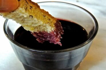 Dipping bread in wine and grape drinks (Based on The Irishman)