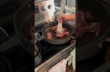 Add oil to heated skillet and brown Italian sausage