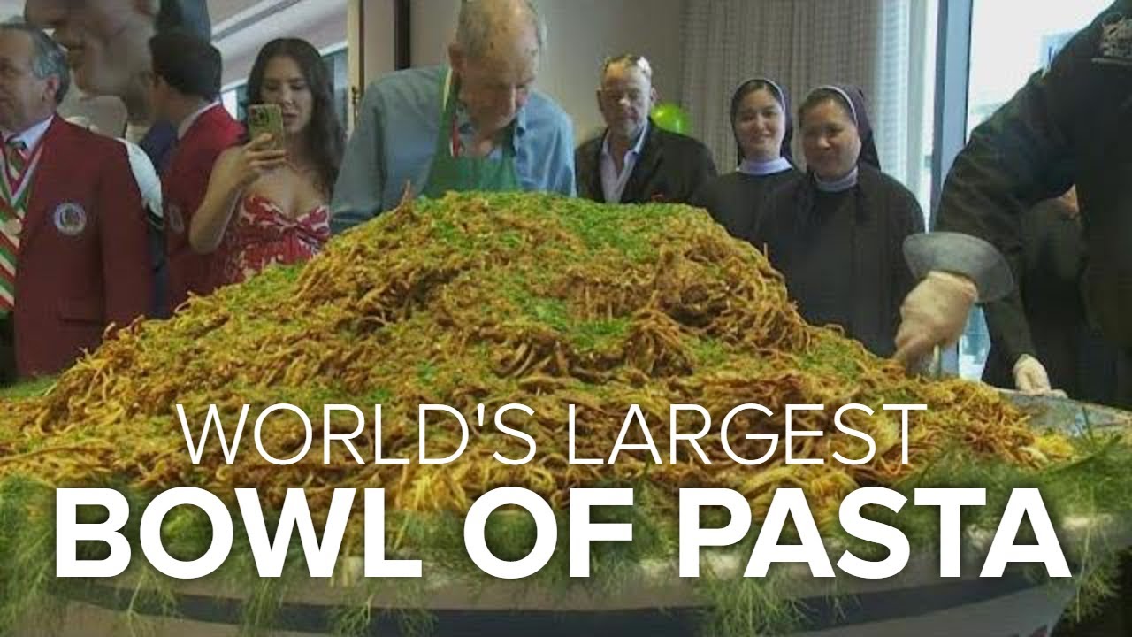 Italian-American St Joseph Society serves up world's biggest bowl of pasta Italian-American St Joseph Society serves up world's biggest bowl of pasta
