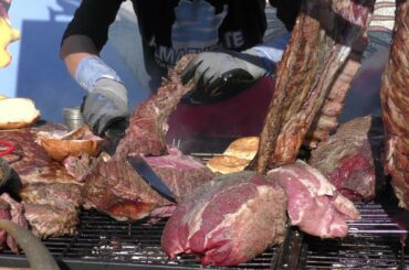 Italy Street Food Fair. Grilled Meat, Burgers, Ribs, Pork Legs, Fried Food and More