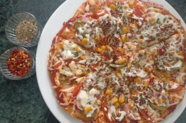 Pizza|| Homemade pizza base recipe #pizza #cheesy #withoutOven #noYeast #vegetable #italian #tasty
