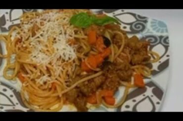 Delicious spaghetti recipe with Italian Sausages and other ingredients.