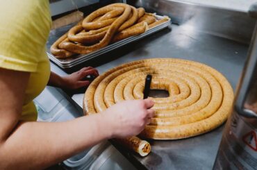 Restaurant makes handmade pepperoni for pizza - Italian food (no talking)
