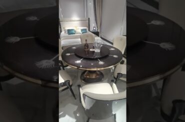 Glossy painting Wooden Luxury Round Dining Table set with Swirl plate and Leather chairs