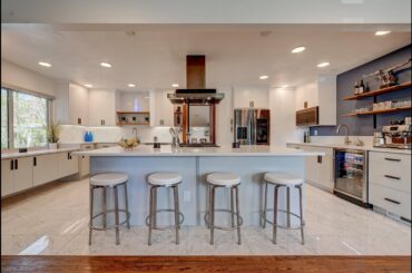 Stunning University Hills Home w/Charming Curb Appeal, Sleek Renovations, Smart Features & a Pool!