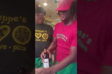 Pouring up fine wine Gusuepes Italian restaurant.