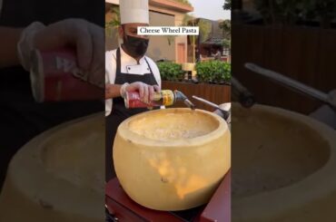 cheese wheel white sous pasta famos italian food