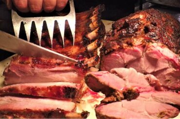 Cutting Smoked Pork Loin and Ribs. Biker Fest 2022, Lignano. Italy Street Food