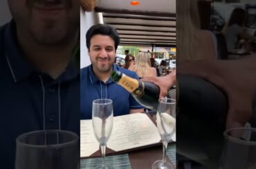 Waiter opening Moet Chandon