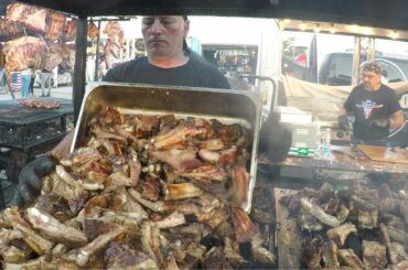 Italy Street Food. Huge Grills Superloaded of Sausages, Ribs, Steaks. Biker Fest 2022. Lignano Italy